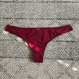 NEVER WORN- thong type cheeky swim bottoms